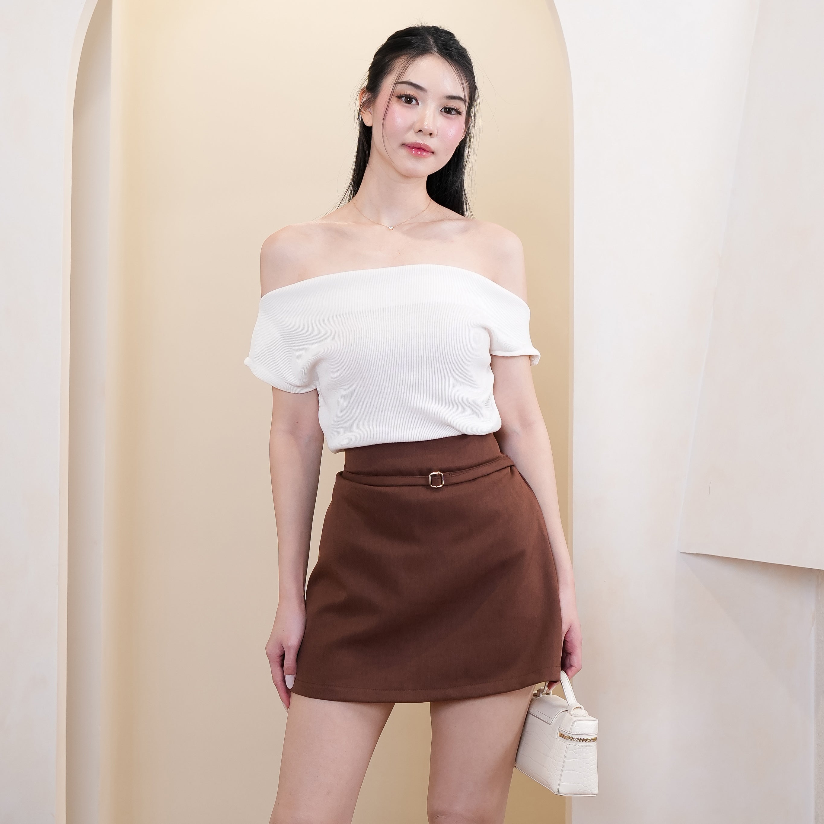 Clovira Buckle Mini Skirt